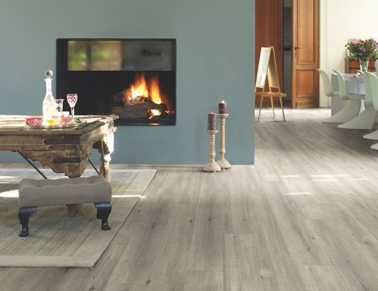 Modern looking space achieved with brand new and expertly fitted laminate flooring, by UK Carpets and curtains.